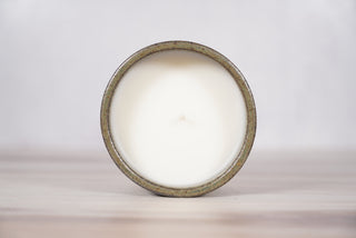 Autumn Green dark green glaze candle on light brown speckled ceramic vessel, fifth view