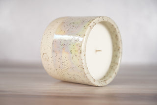 Mother of pearl glaze on white speckled ceramic candle vessel, second view