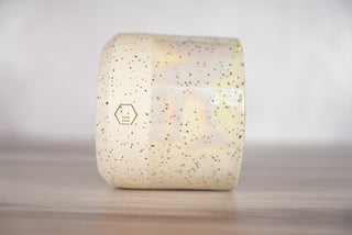 Mother of pearl glaze on white speckled ceramic candle vessel, third view