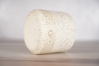 White glaze on white speckled ceramic candle vessel, fourth view